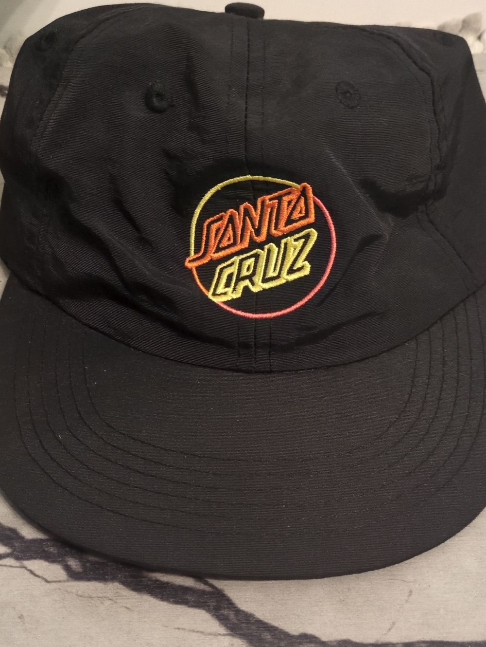 Santa Cruz Black Cap with Yellow and Orange Accent